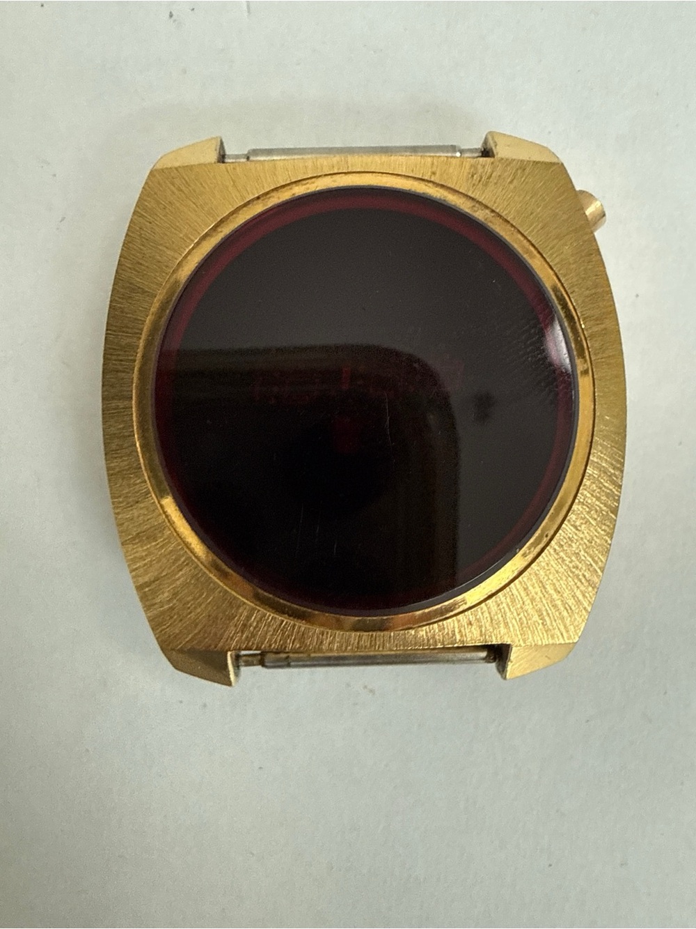 Gold-Tone Digital Watch Case with Dark Red Lens